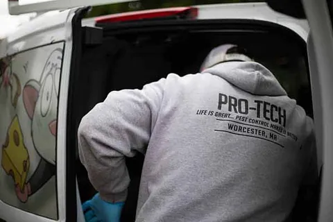 Pro-Tech employee working in a home